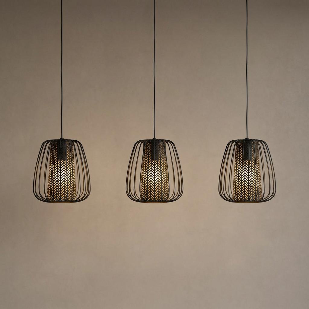 Three black wire cage pendant lights with patterned fabric shades hanging against a neutral wall.