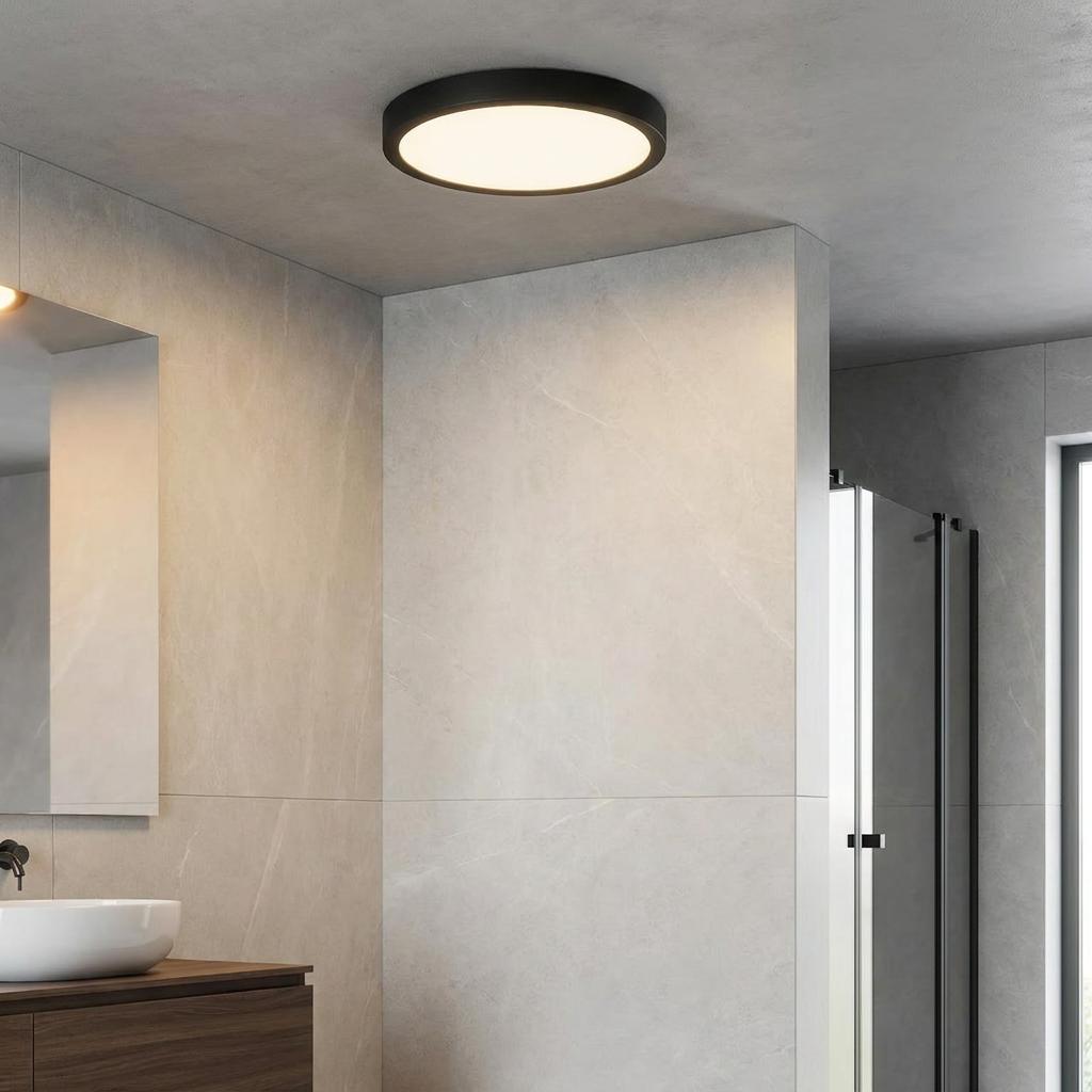 Eglo Fueva 5 LED black flush ceiling light illuminates a modern bathroom with grey marble-style tiles.