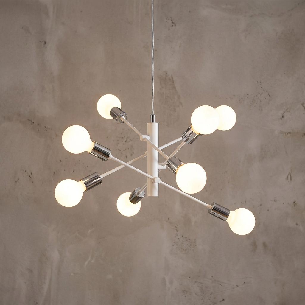 Eglo Gradoli 8-light white and chrome sputnik ceiling pendant with glowing globe bulbs against a textured wall.