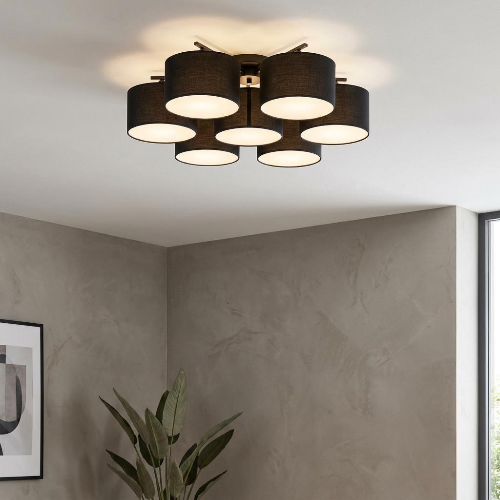 Eglo Pastore 2 ceiling light featuring six black fabric drum shades on a white ceiling in a modern room.