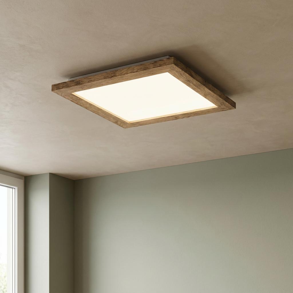 Square flush-mount LED ceiling light with a rustic wood frame, illuminated in a room with sage green walls.