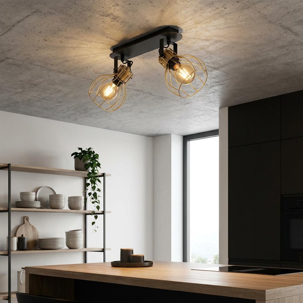 Industrial 2-light brass wire cage bar spotlight mounted on a concrete kitchen ceiling above a wooden island.
