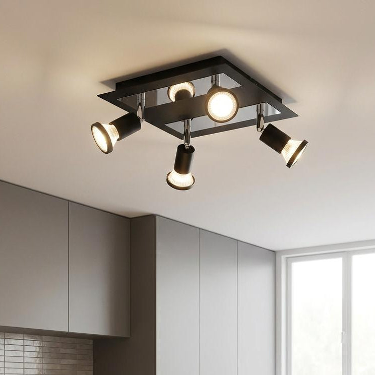 Eglo Sarria black and chrome 4-light plate spotlight mounted on a modern kitchen ceiling.