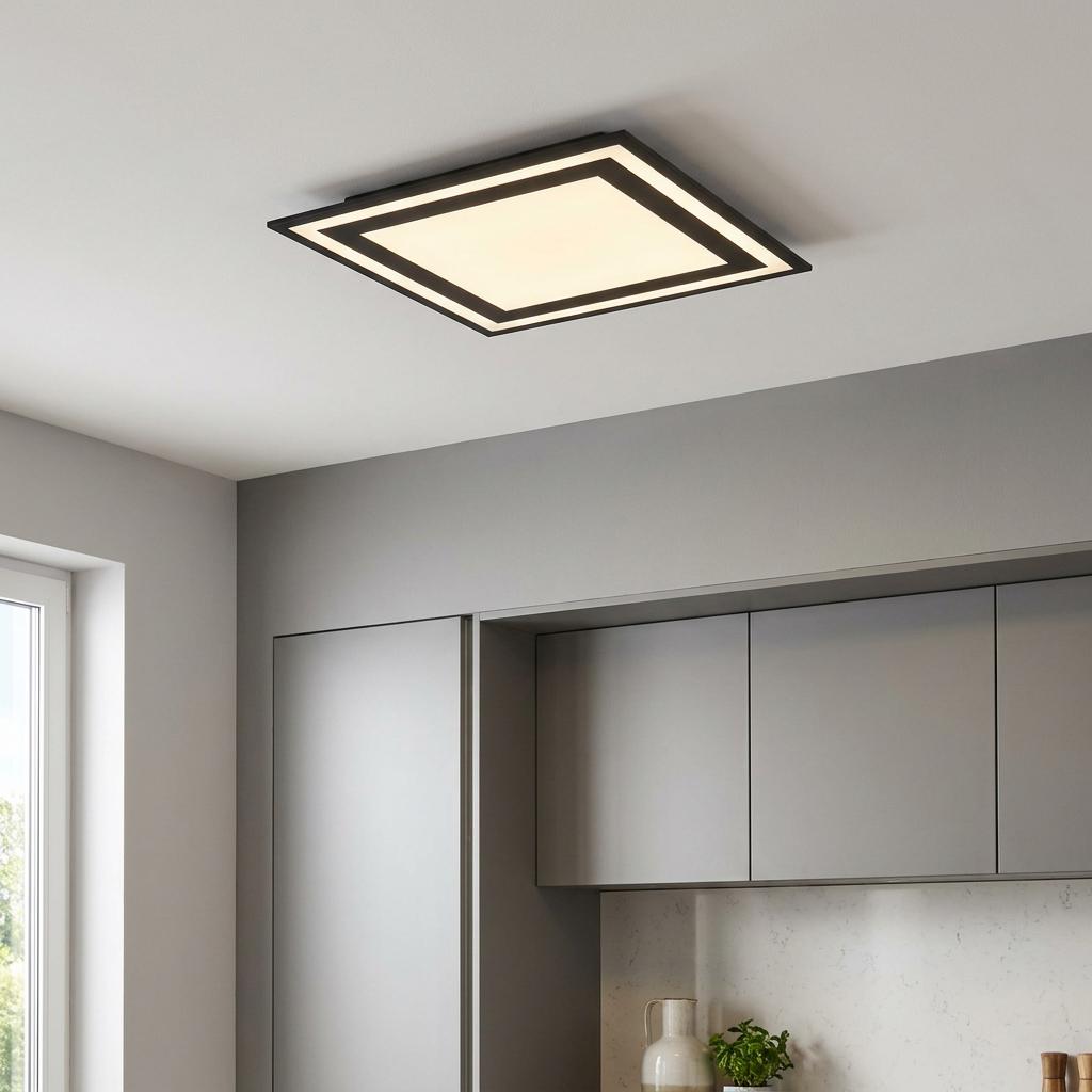 Eglo Savatarila square black and white LED flush ceiling light in a modern kitchen.