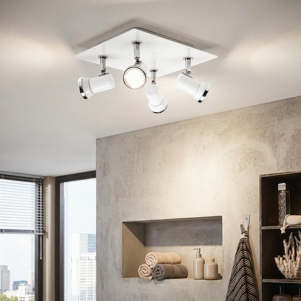 Eglo Tamara 1 four-light white and chrome bathroom spotlight plate mounted on a ceiling above a towel niche.