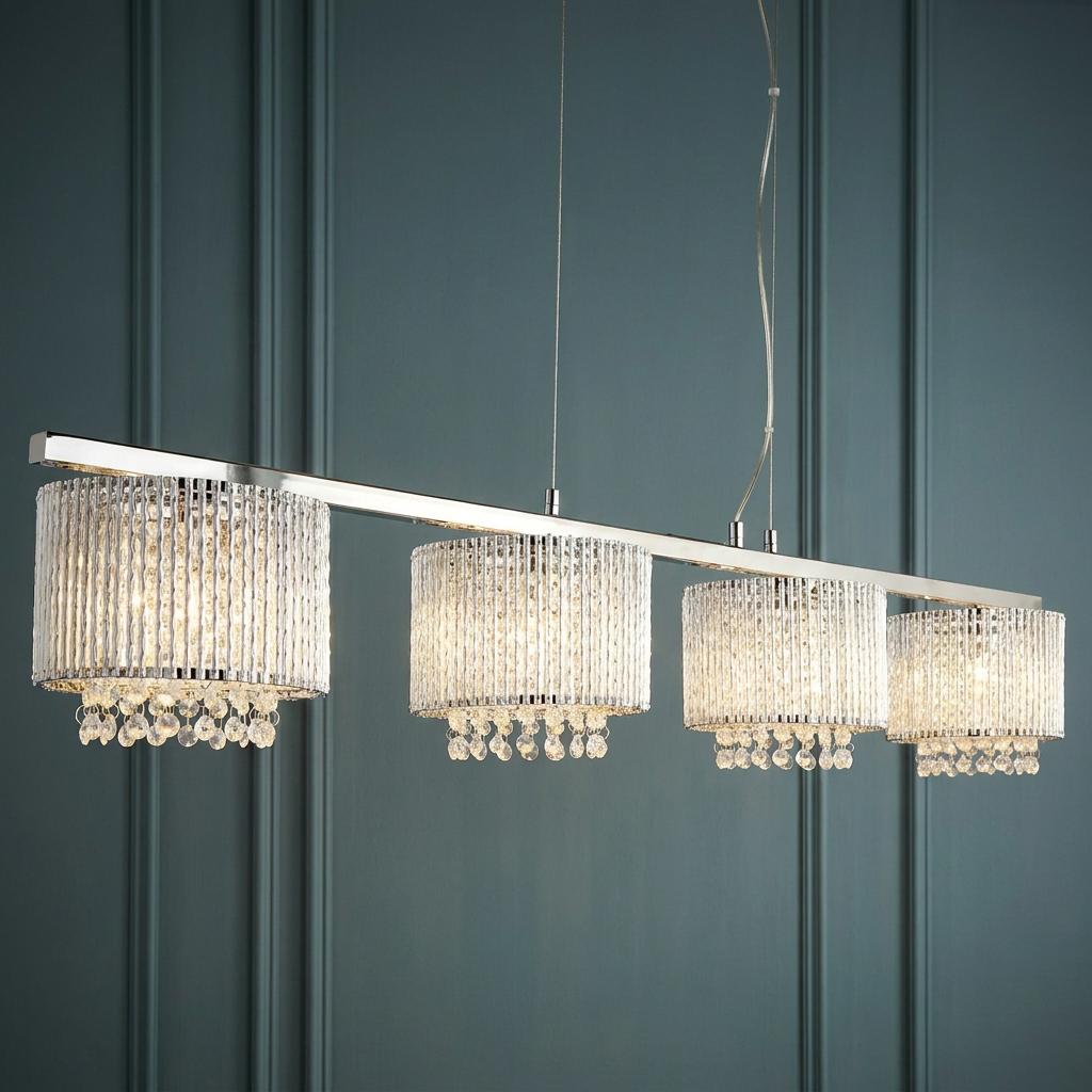 Elise 4-light chrome bar pendant with crystal cylinder shades and hanging drops against a teal paneled wall.