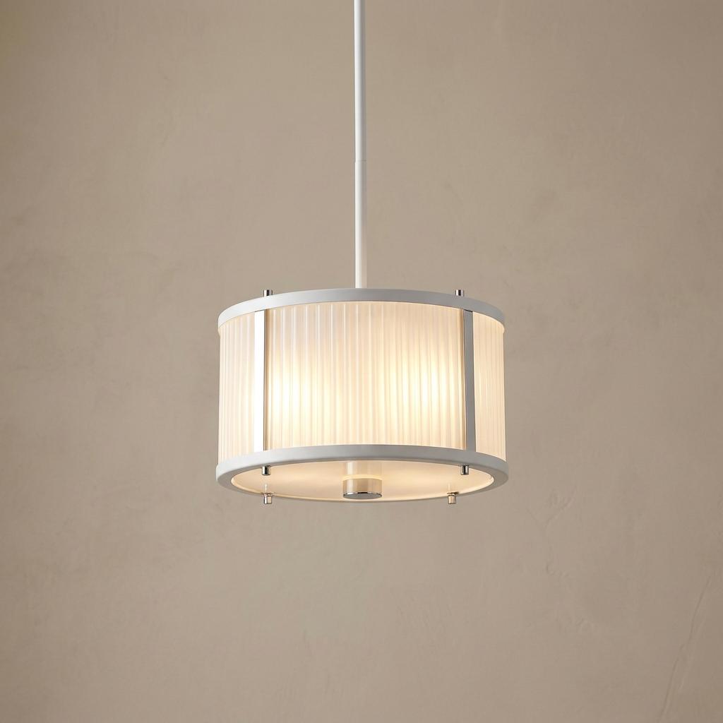 Elstead Corona pendant featuring a white frame, ribbed glass drum shade, and polished nickel accents.
