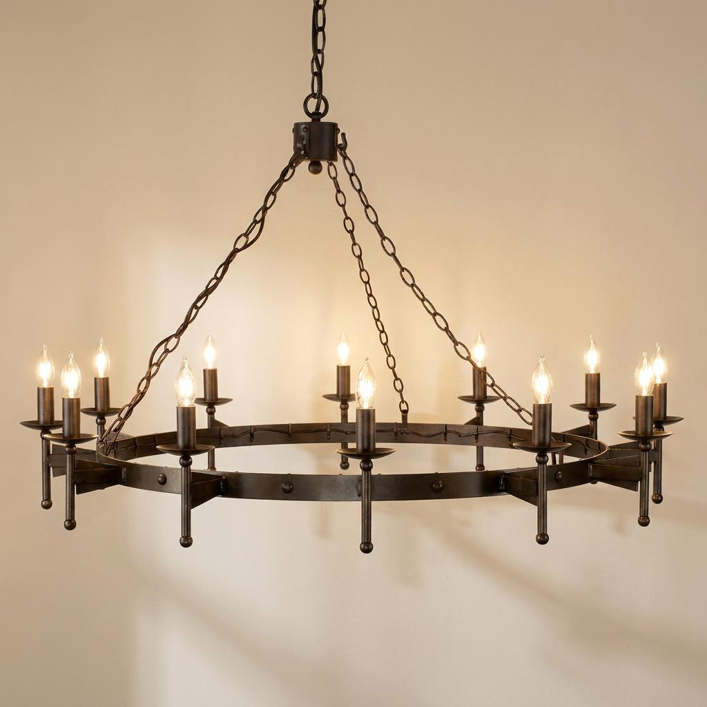 Twelve-light circular chandelier in old bronze finish with a medieval chain suspension against a plain wall.