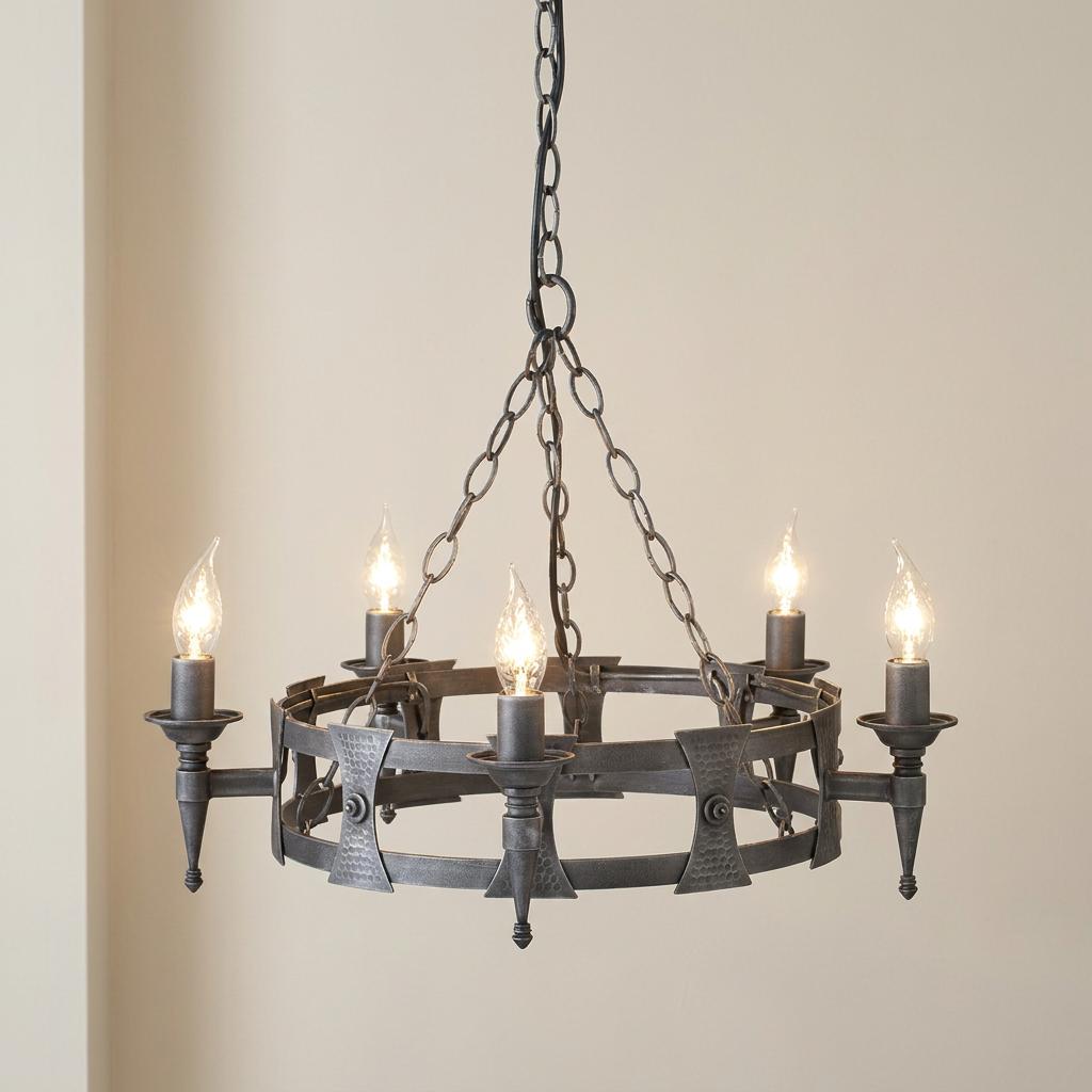 Five-light silver chandelier with a circular wrought iron-style frame and candle bulbs hanging from a chain.