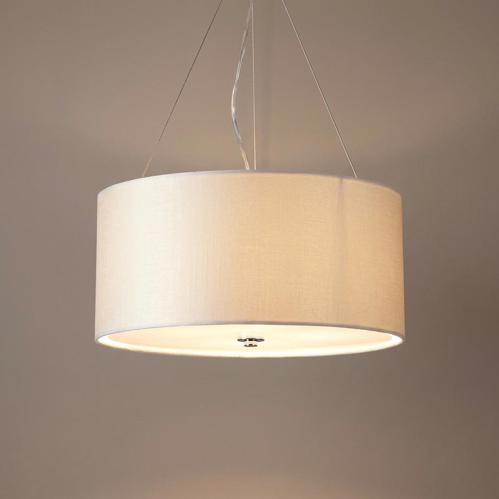 Drum-shaped fabric pendant light with a bottom diffuser, suspended by thin cables.
