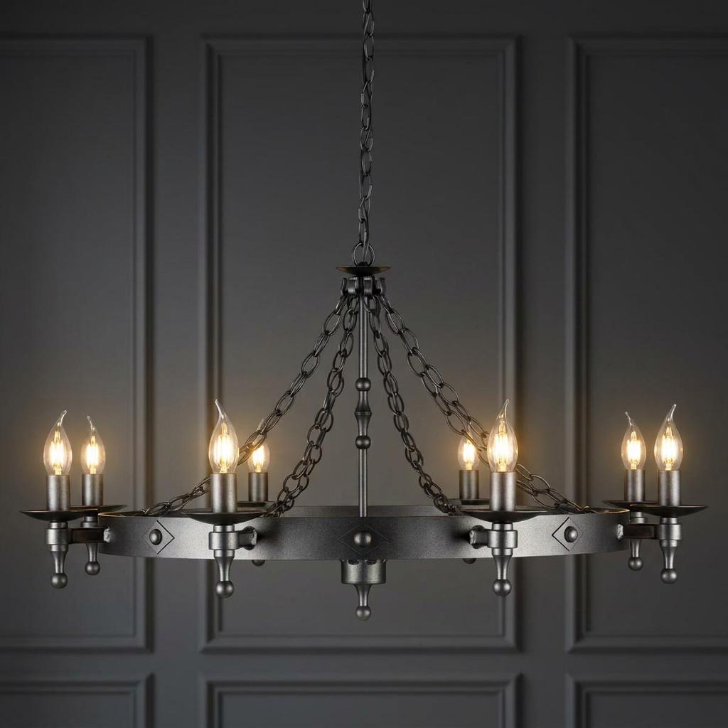 Eight-light medieval-style circular chandelier in a graphite finish against a dark grey paneled wall.