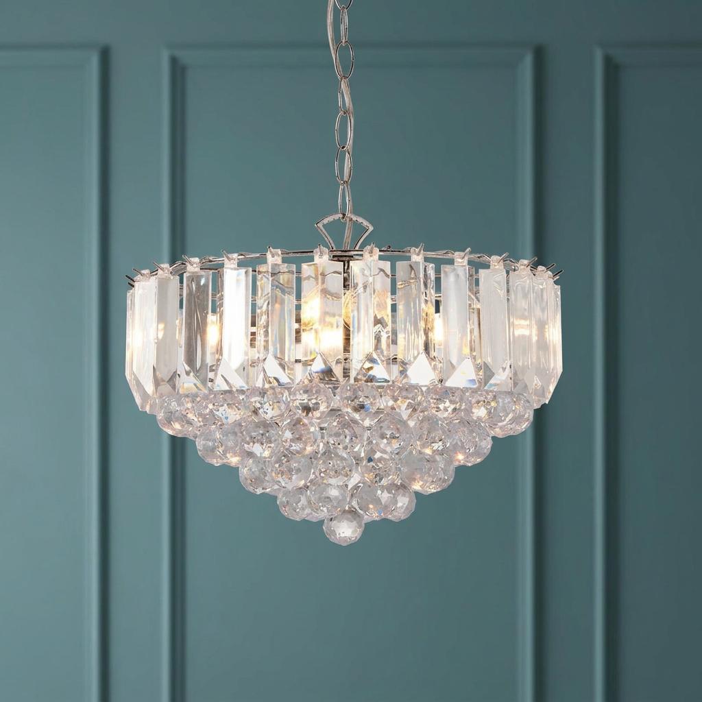Endon Fargo chrome and clear acrylic 3-light ceiling pendant with glowing crystals against a teal paneled wall.