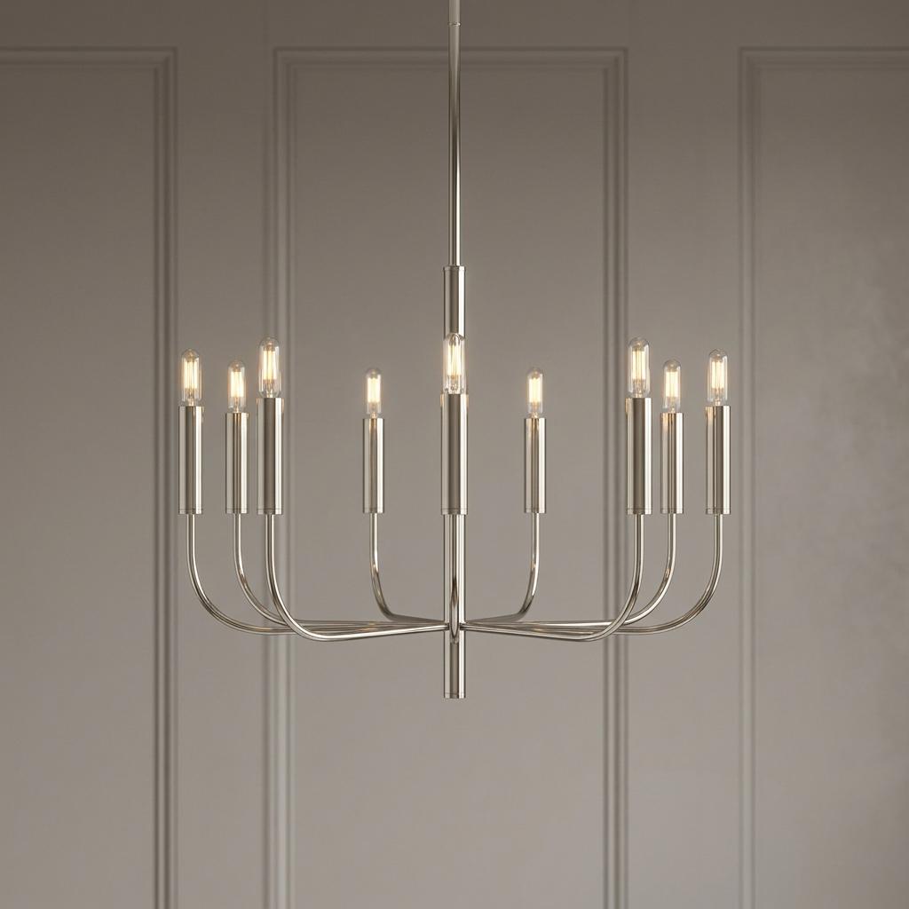 Polished nickel 9-light chandelier with minimalist curved arms and glowing bulbs against a neutral paneled wall.