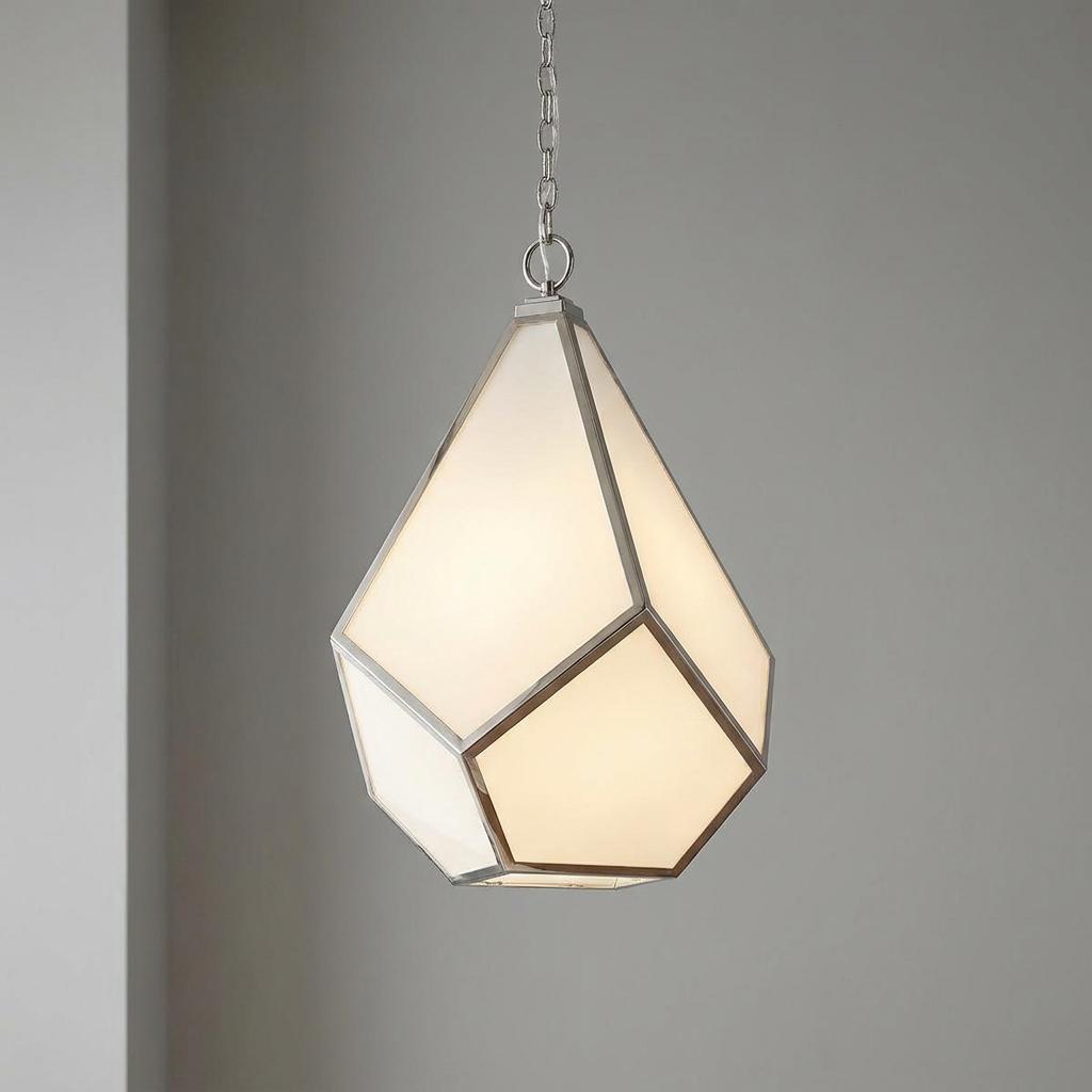 Geometric diamond-shaped pendant chandelier with frosted glass and polished nickel frame hanging against a gray wall.