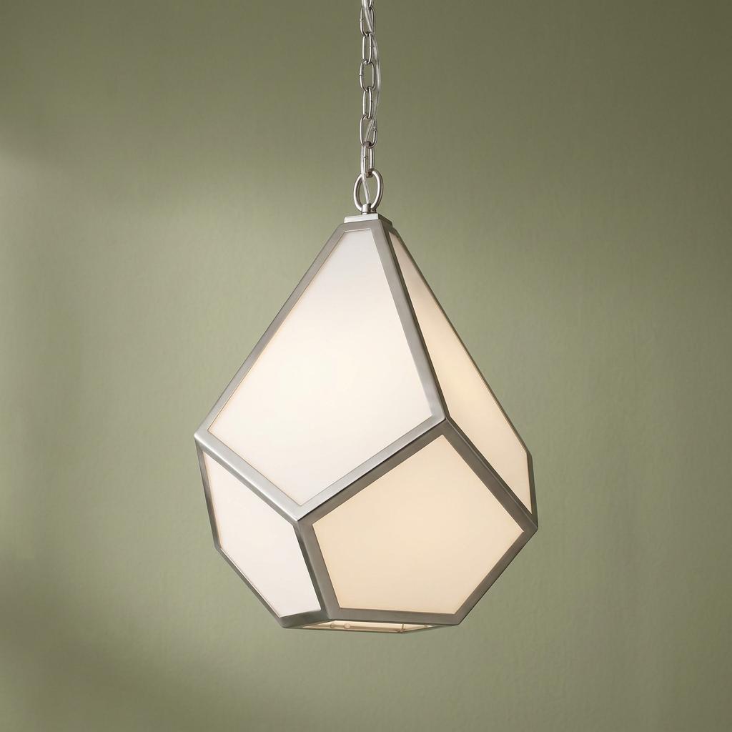 A geometric diamond-shaped pendant light with frosted glass panels and a nickel frame hangs from a chain.