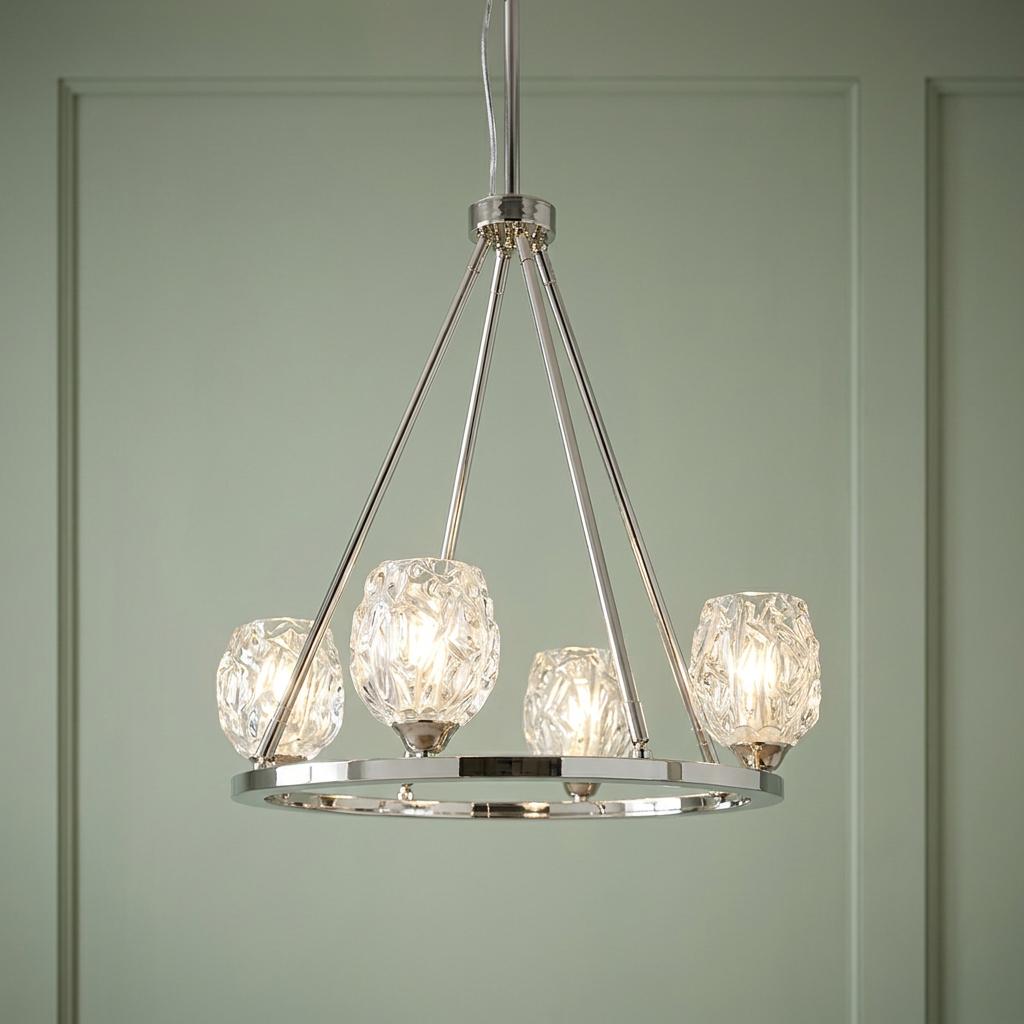 Feiss Rubin 4-light chandelier in polished nickel with textured glass shades against a sage green wall.