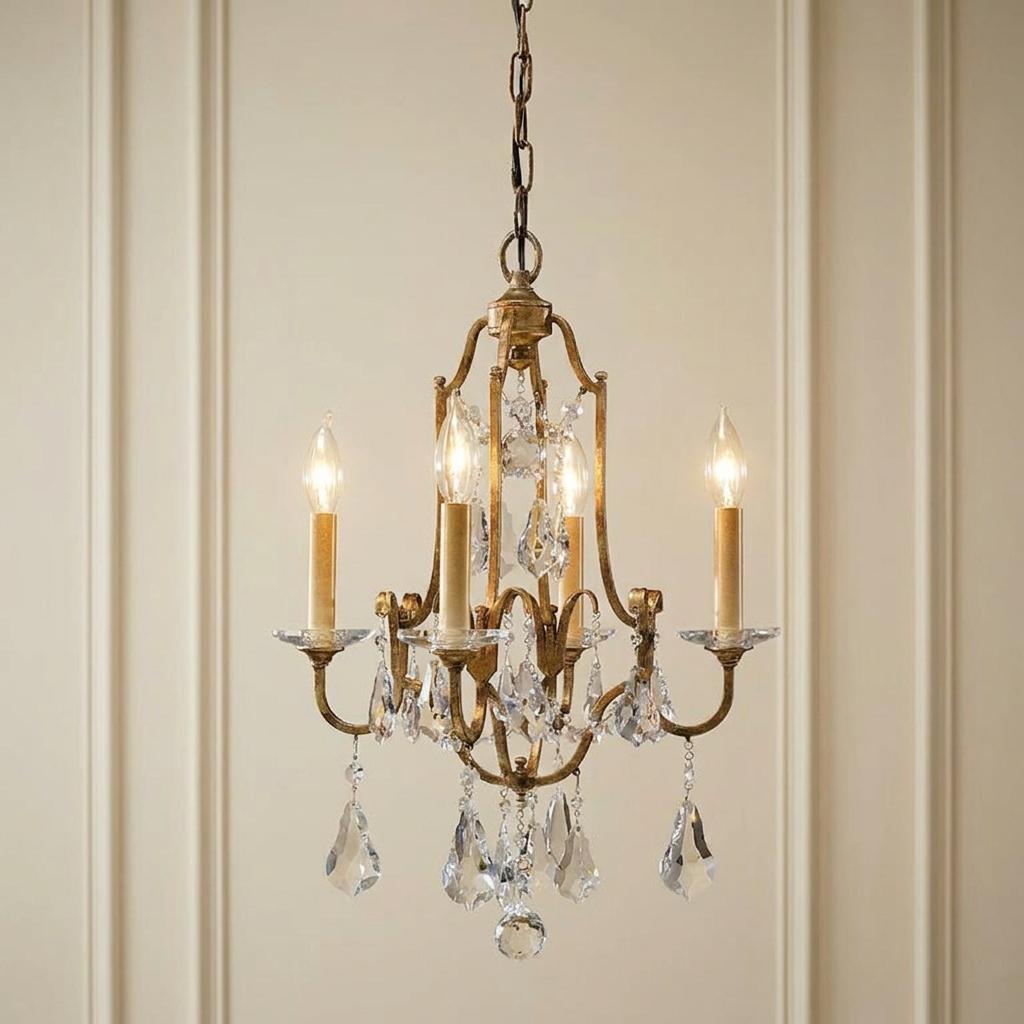 Feiss Valentina 4-light bronze chandelier with crystal droplets and candle bulbs against a paneled wall.