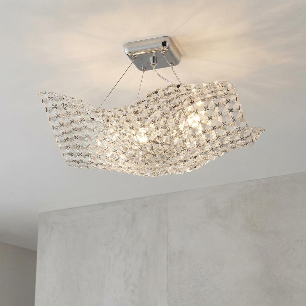 Glitter 4 light chrome and crystal semi flush ceiling light with a wavy crystal mesh shade on a plain ceiling.
