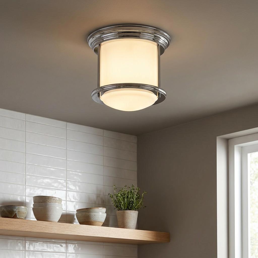 Opal glass and chrome Hadrian flush mount ceiling light illuminating a modern kitchen space.