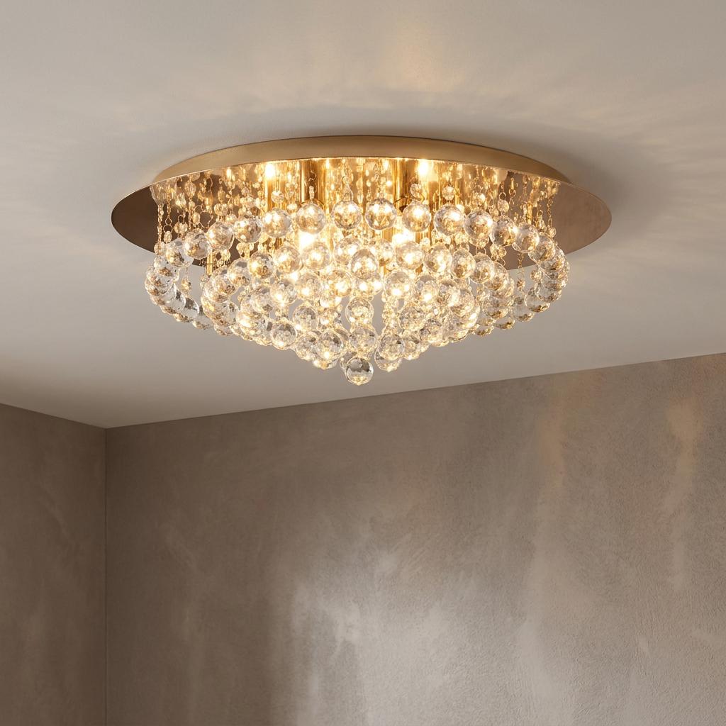 Gold flush ceiling light featuring cascading crystal spheres that emit a warm, shimmering glow.