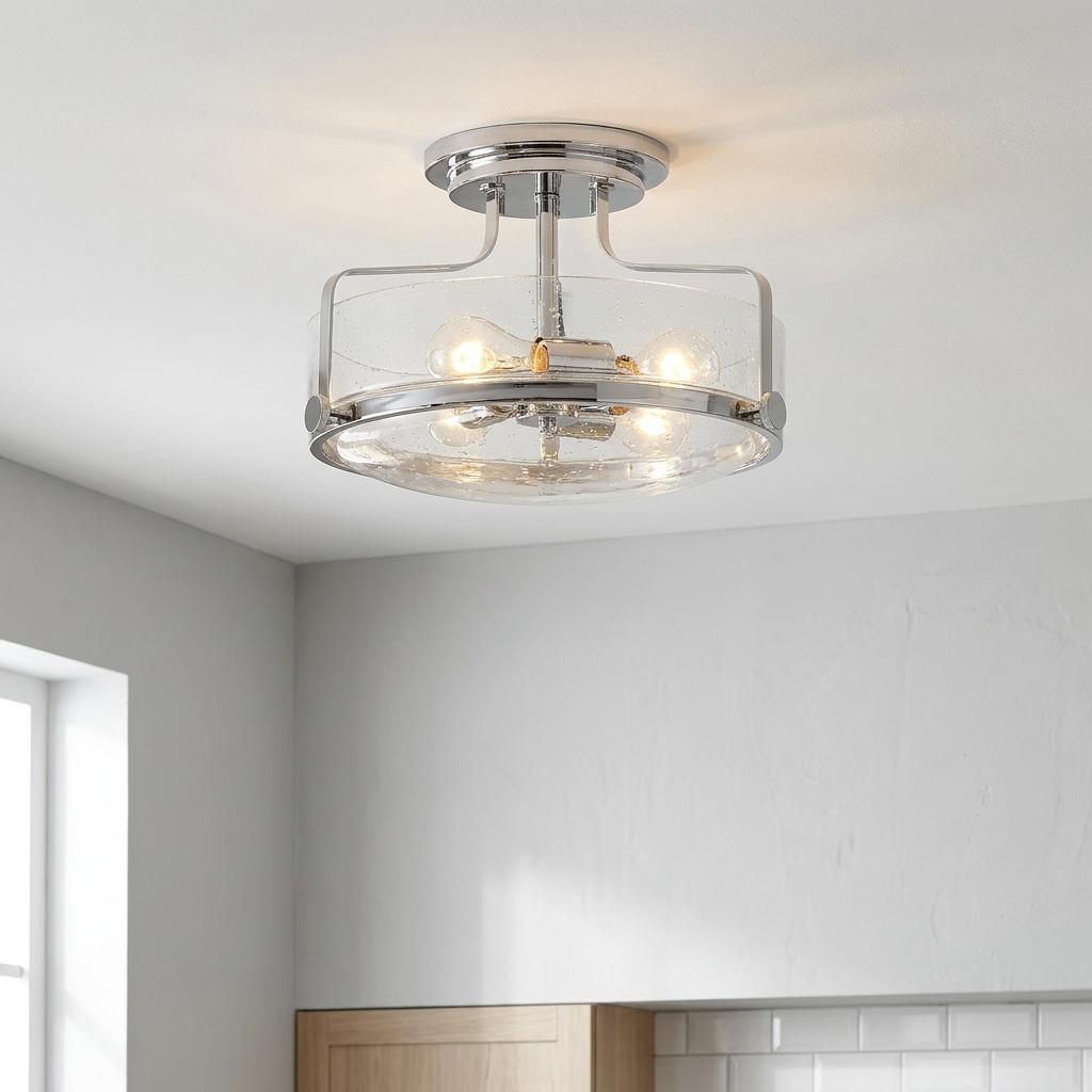 Polished chrome semi-flush ceiling light with a seeded glass drum shade and three glowing bulbs in a modern room.