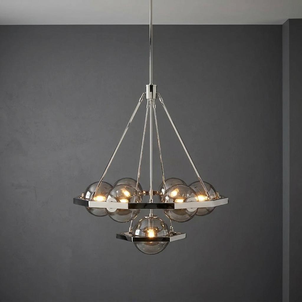 Harper 7-light polished nickel chandelier with smoky glass globes in a tiered hexagonal frame against a gray wall.