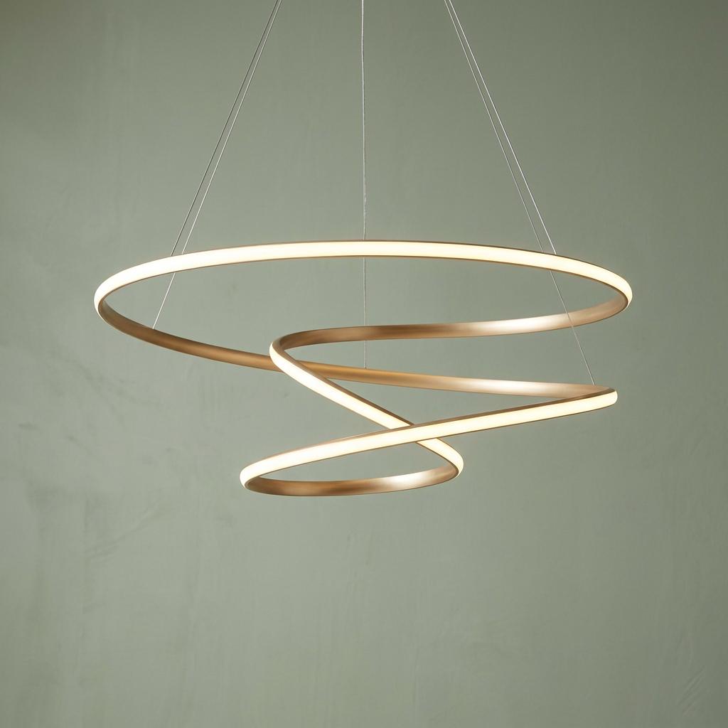 Helice modern spiral gold LED ceiling pendant light with a minimalist glowing ribbon design against a pale green wall.