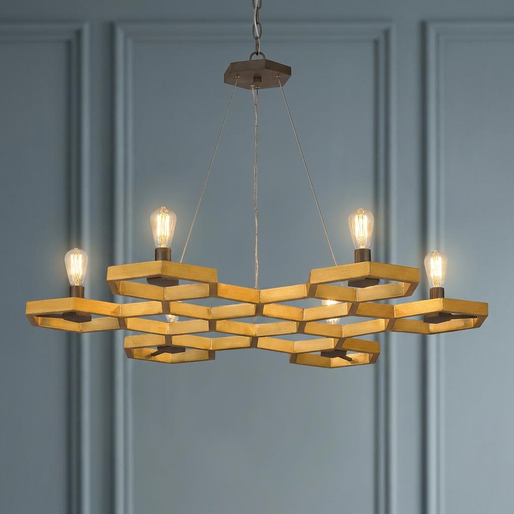 Six-light gold geometric chandelier with a honeycomb pattern and exposed Edison bulbs against a blue paneled wall.