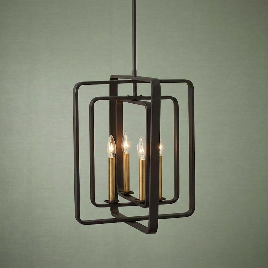 Bronze 4-light pendant with nested rectangular frames and brass candle sleeves against a green wall.