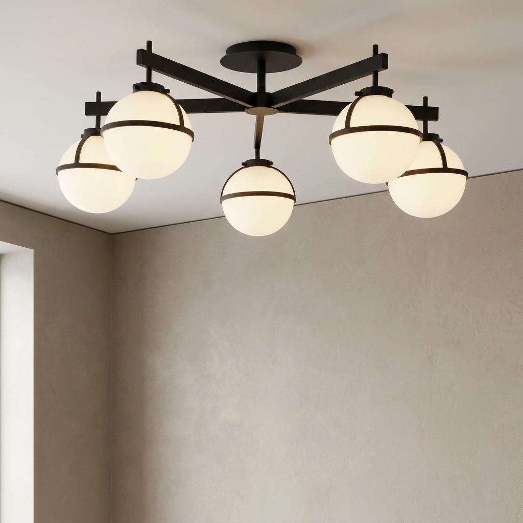 Hollis 5-light black semi-flush ceiling light with opal glass globe shades mounted on a white ceiling.