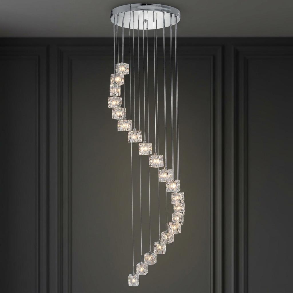 Cascading spiral of glass cube LED pendants suspended from a chrome base against a dark panelled wall.