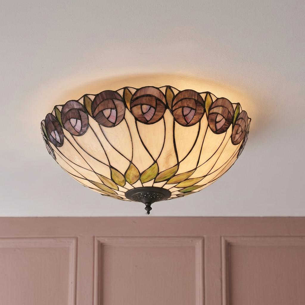 Hutchinson Tiffany flush ceiling light with stained glass floral pattern in purple and green on a white ceiling.