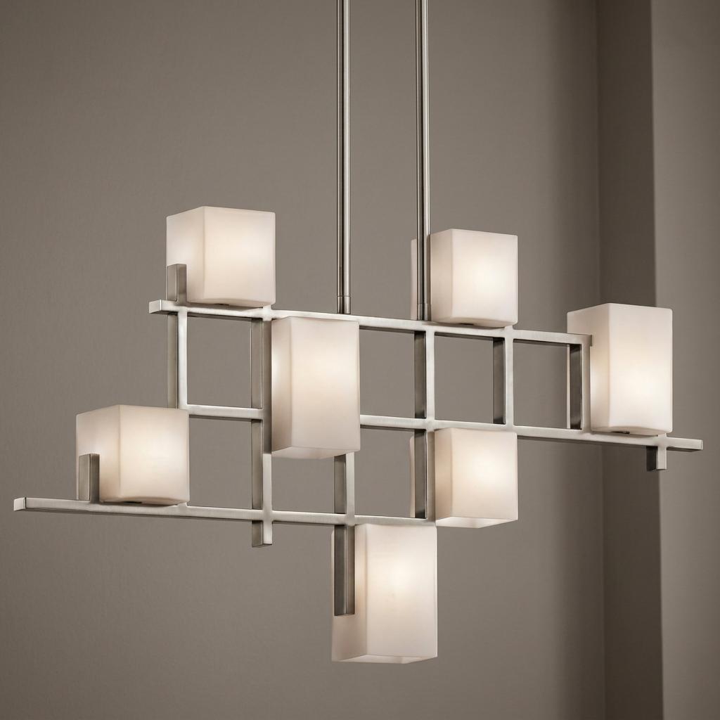 Modern pewter linear chandelier featuring seven frosted glass cubes on an asymmetrical geometric grid.