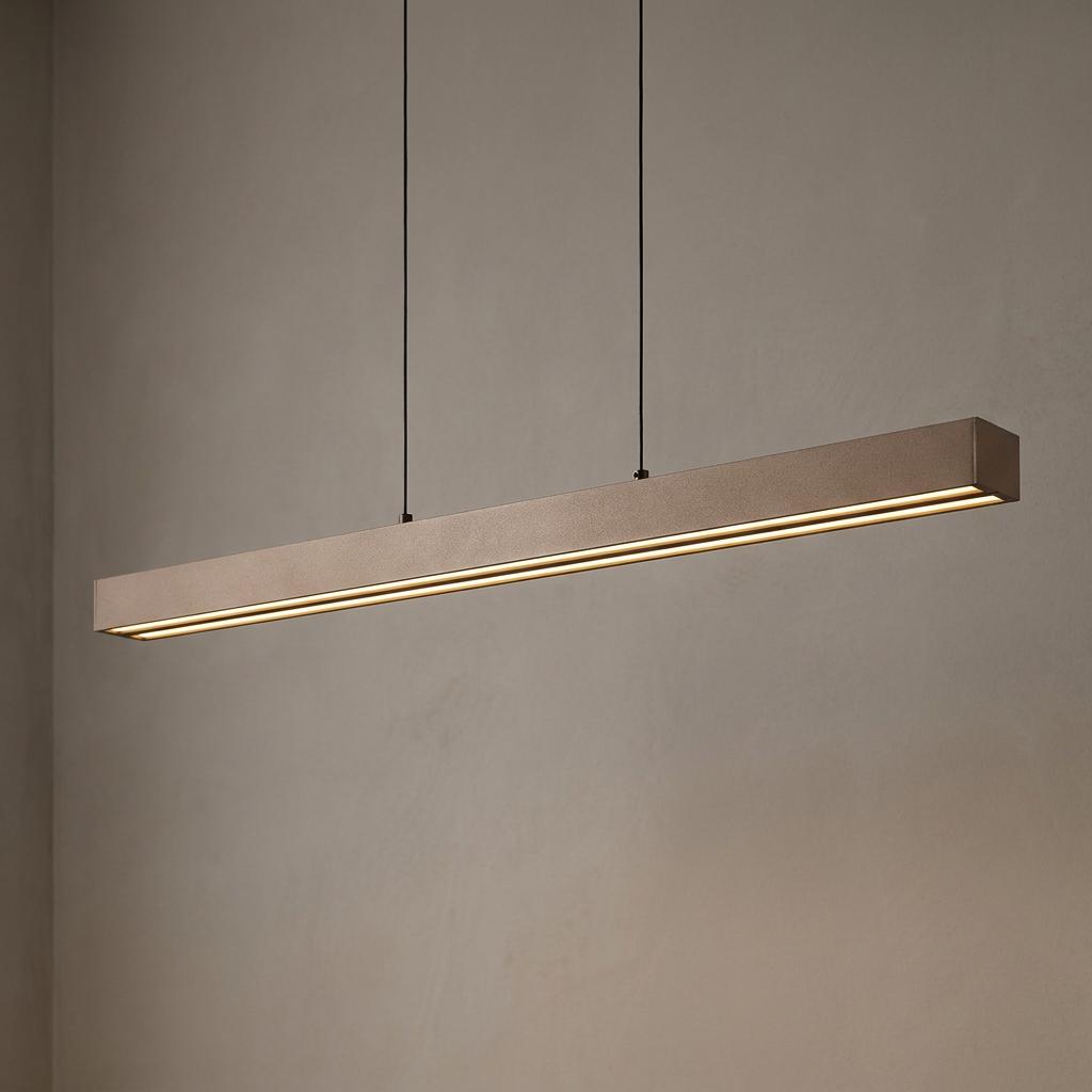 Modern linear latte LED pendant light with a sleek rectangular design hanging against a neutral wall.