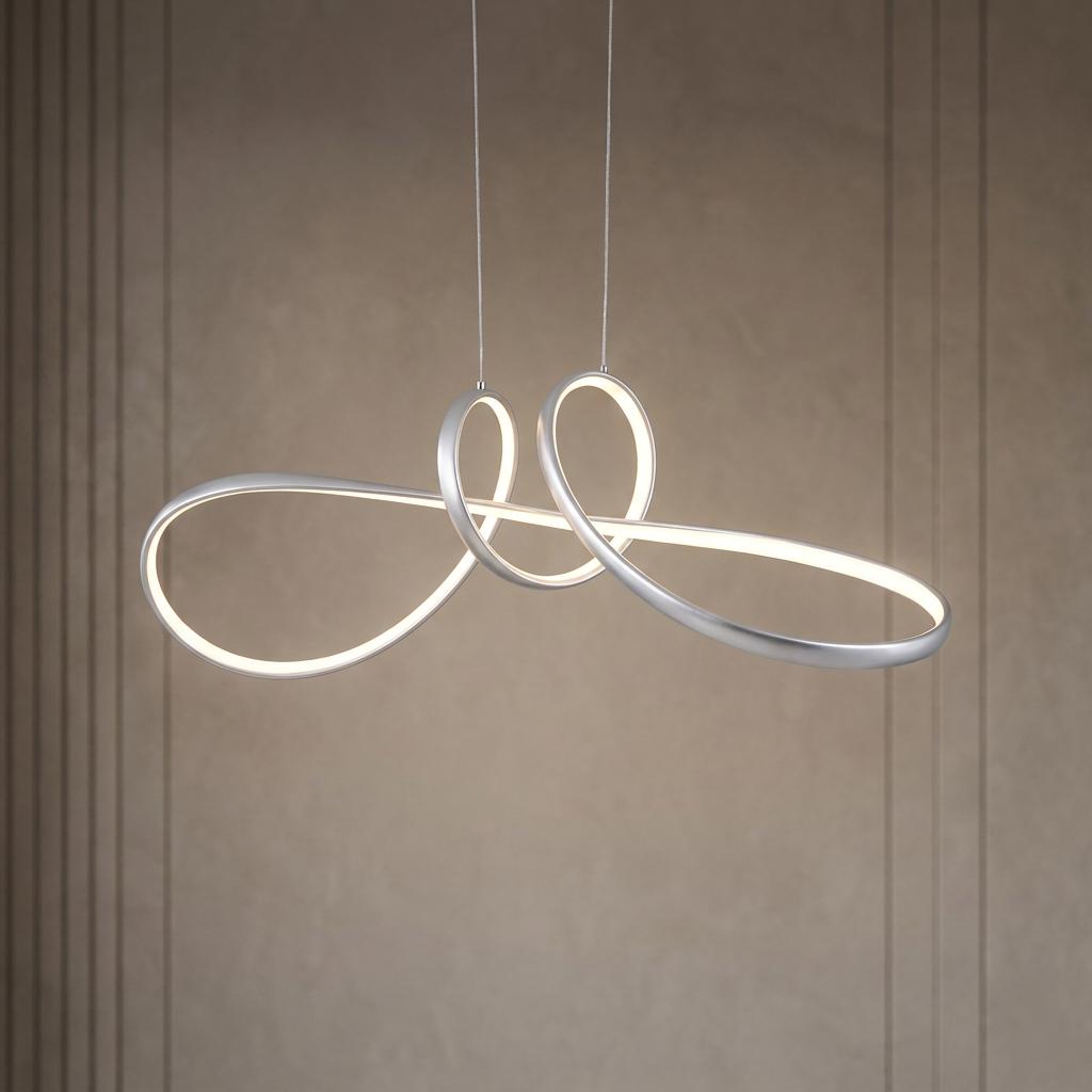 A modern grey metal LED pendant light featuring a flowing, intertwined ribbon design suspended against a beige wall.