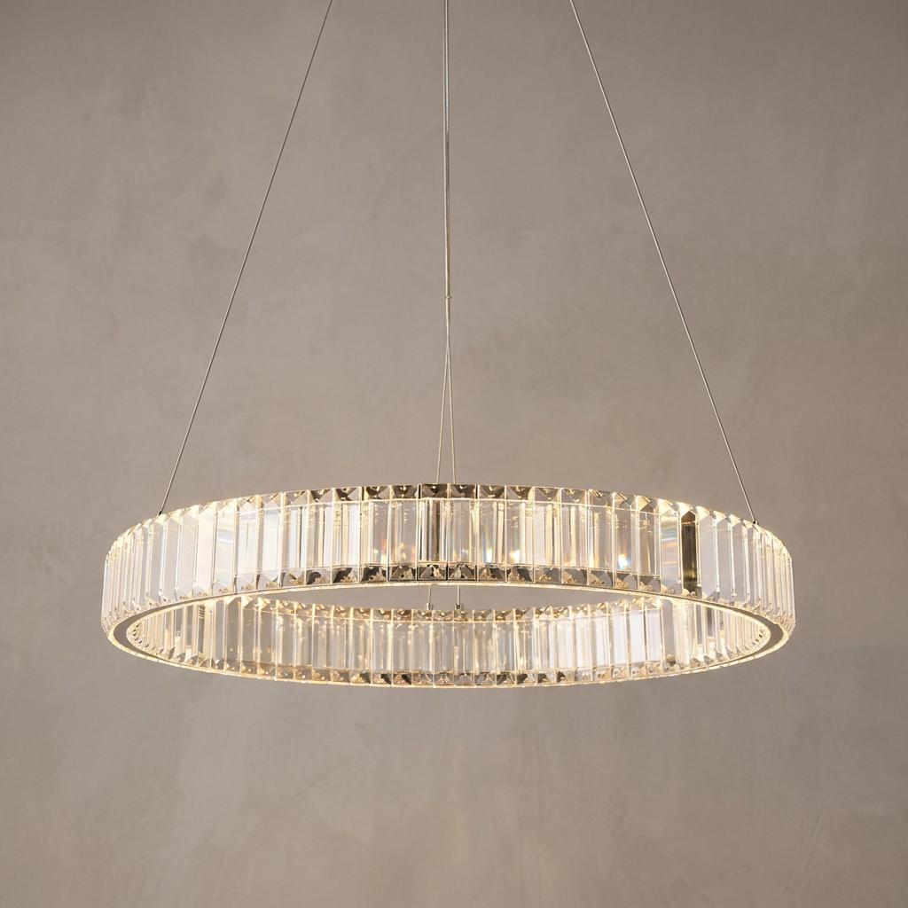 Majestic chrome and glass crystal LED ring ceiling pendant glowing against a neutral background.