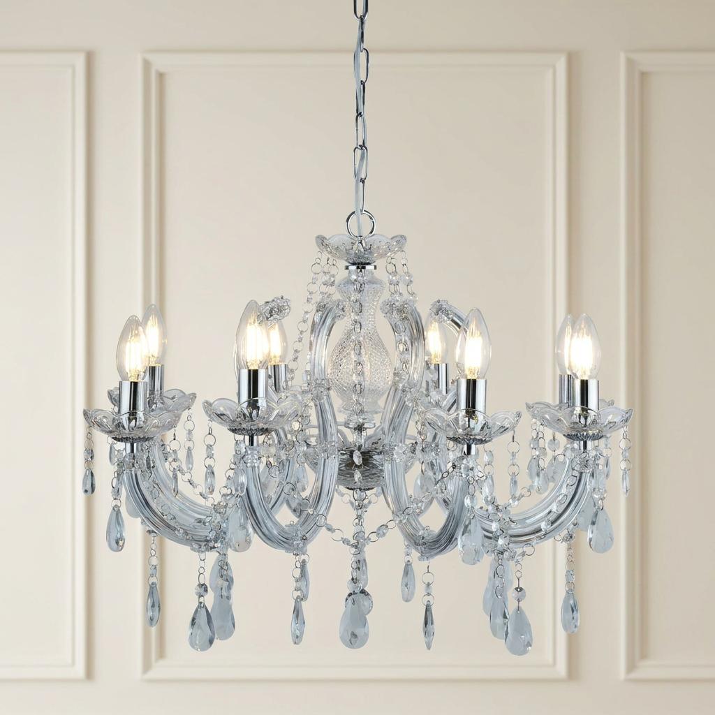 An 8-light Marie Therese chandelier in chrome with clear crystal glass and hanging droplets.