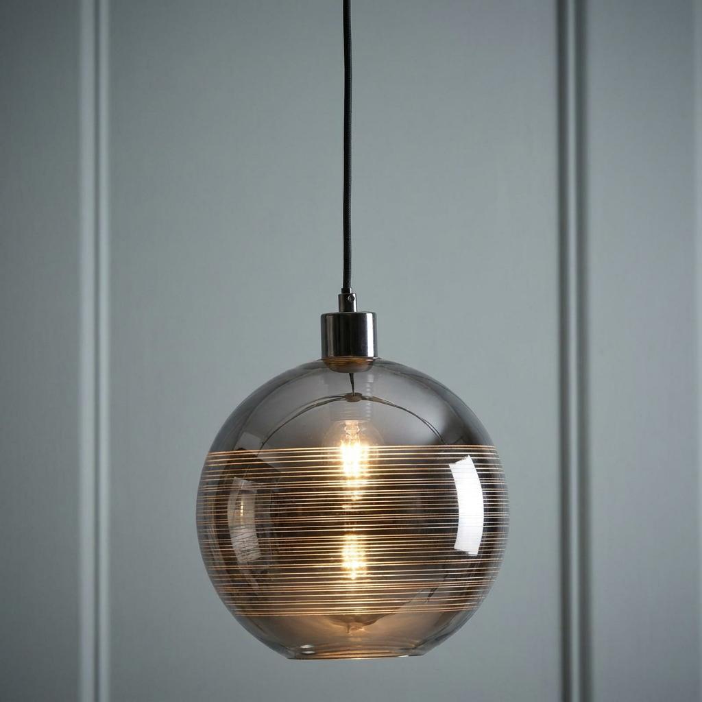 Oaks Lighting Lia Chrome Plated Ceiling Pendant with a striped smoked glass globe shade against a grey wall.