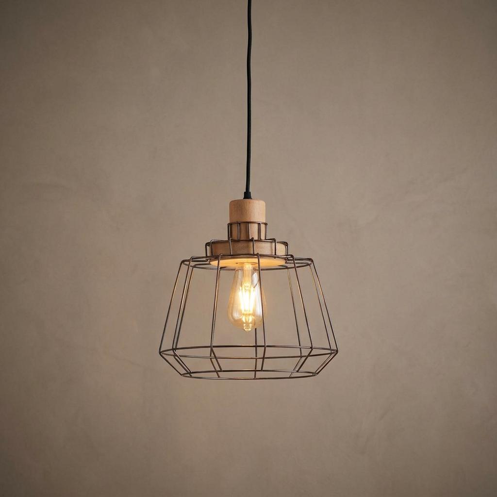 Copper wire frame and wood ceiling pendant light with a glowing bulb against a neutral background.
