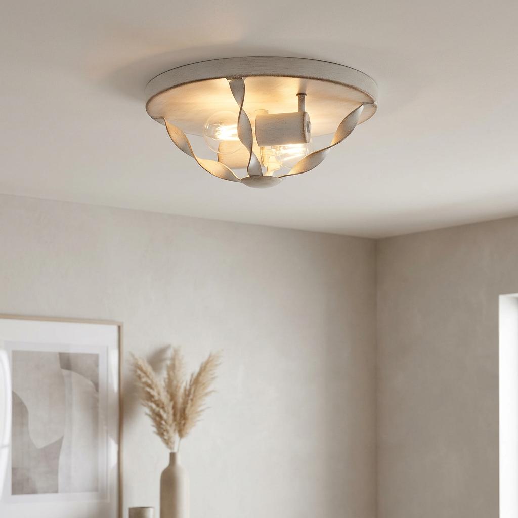 Antique white 2-light flush mount ceiling fixture with a rustic metal ribbon cage design.