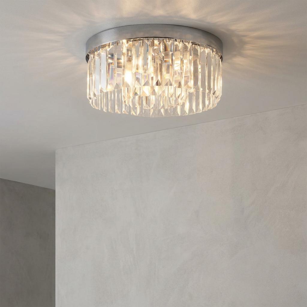 Saxby Crystal 5-light chrome flush ceiling light with glass prisms casting a pattern on a white ceiling.