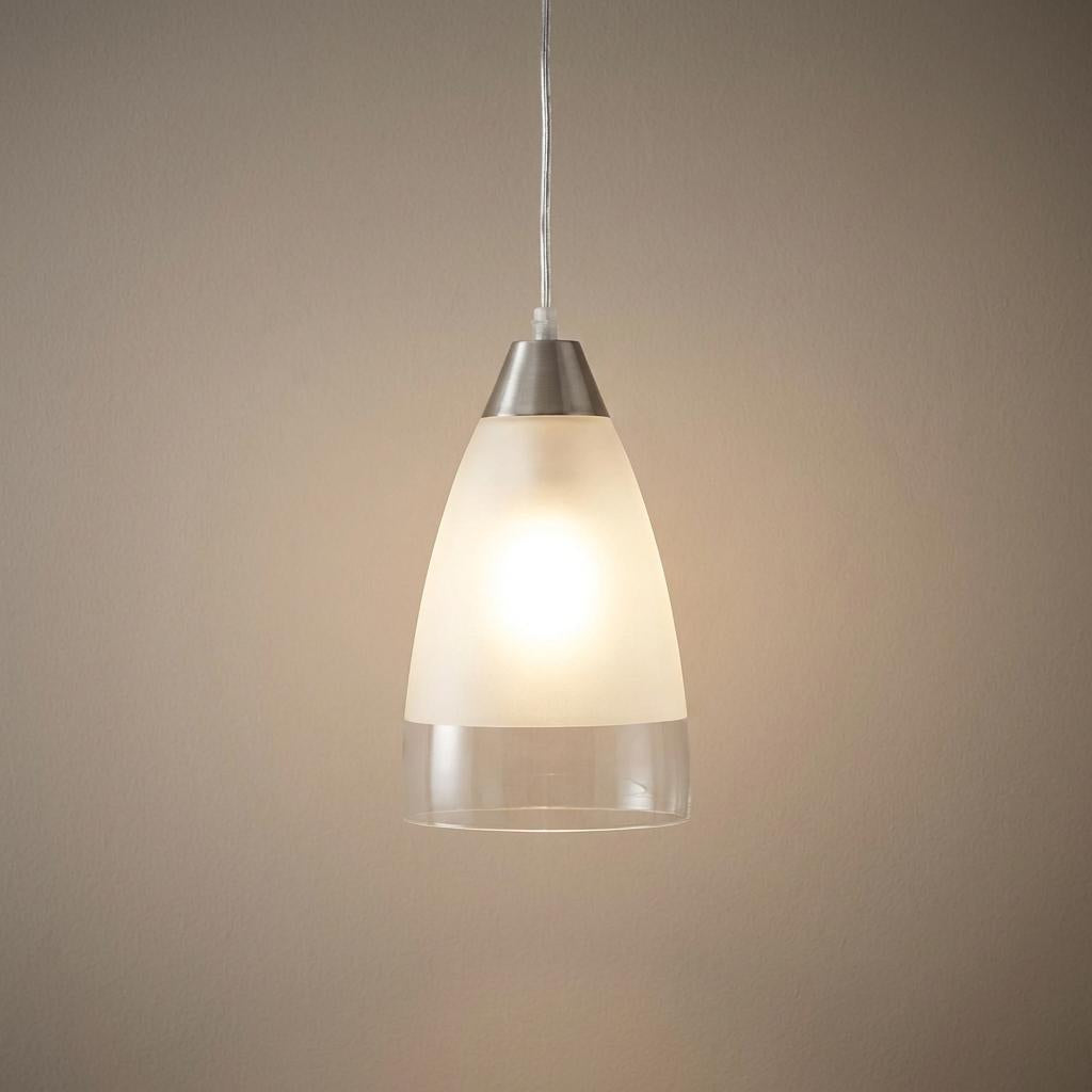 An illuminated Ankara ceiling pendant with a satin silver finish and two-toned frosted and clear acid glass shade.