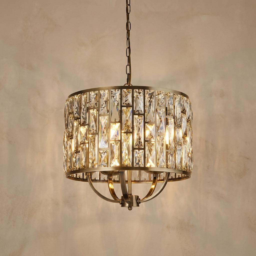 Searchlight Bijou 5-light brass pendant with champagne glass crystals hanging against a textured beige wall.