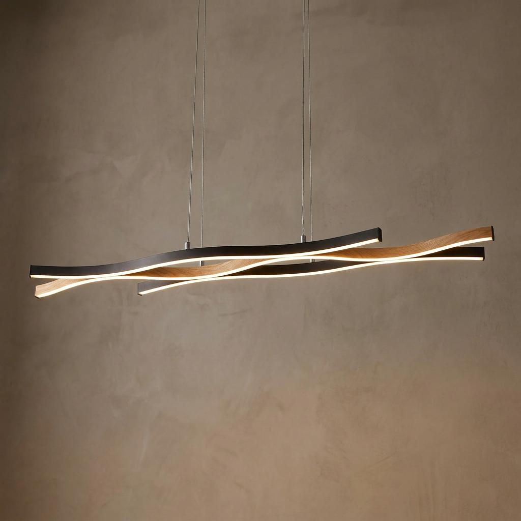 Modern wavy pendant light with black metal and wood-effect bars and integrated LED strips hanging against a neutral wall.