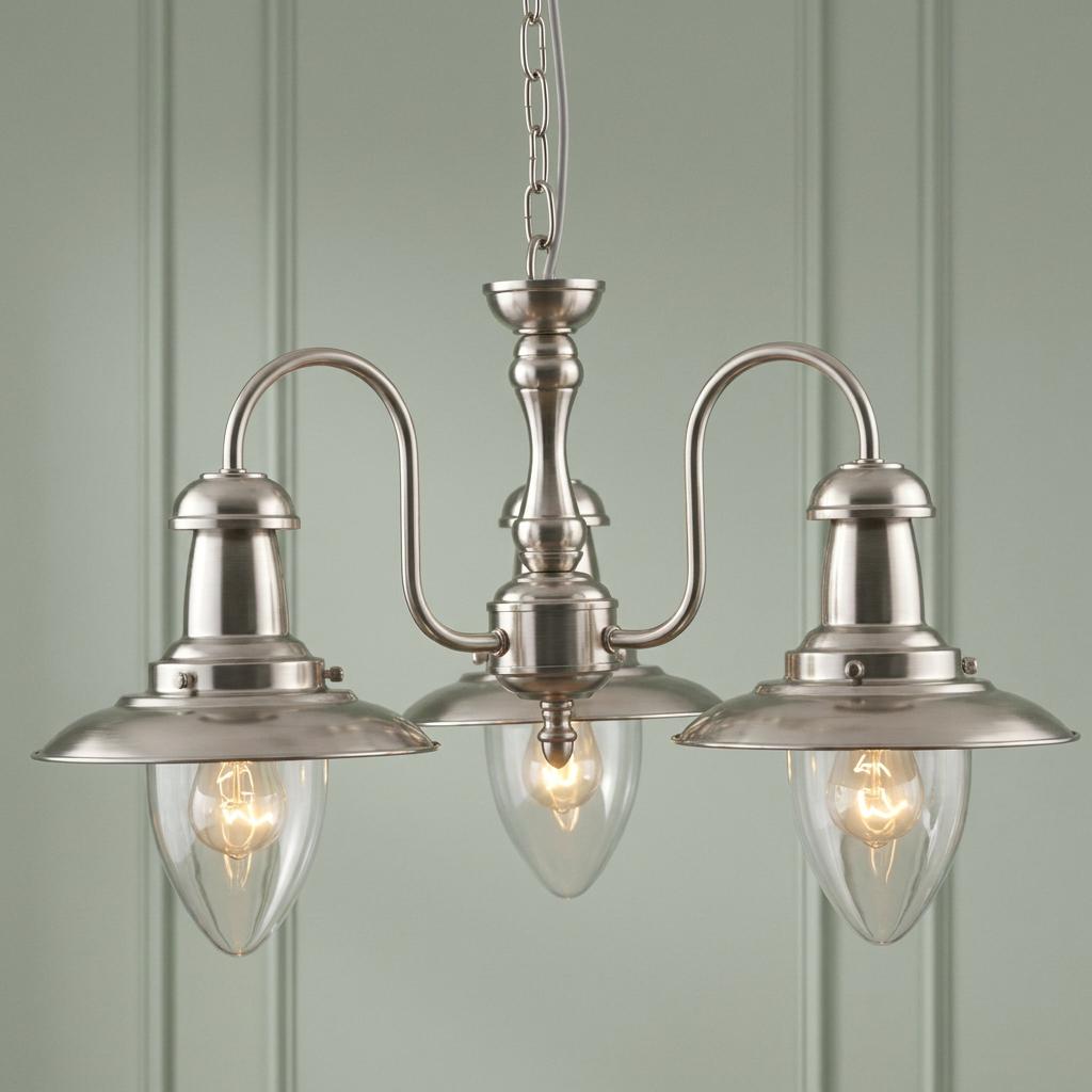 Satin silver three-light fisherman pendant with teardrop glass shades and wide metal brims.