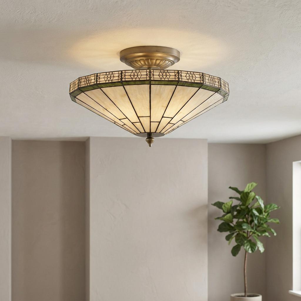 Art Deco Tiffany semi-flush ceiling light with cream glass panels and brass hardware in a neutral room.