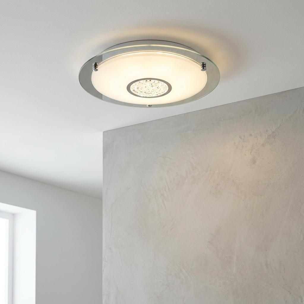 Searchlight Portland LED flush ceiling light with chrome and crystal accents on a white ceiling.