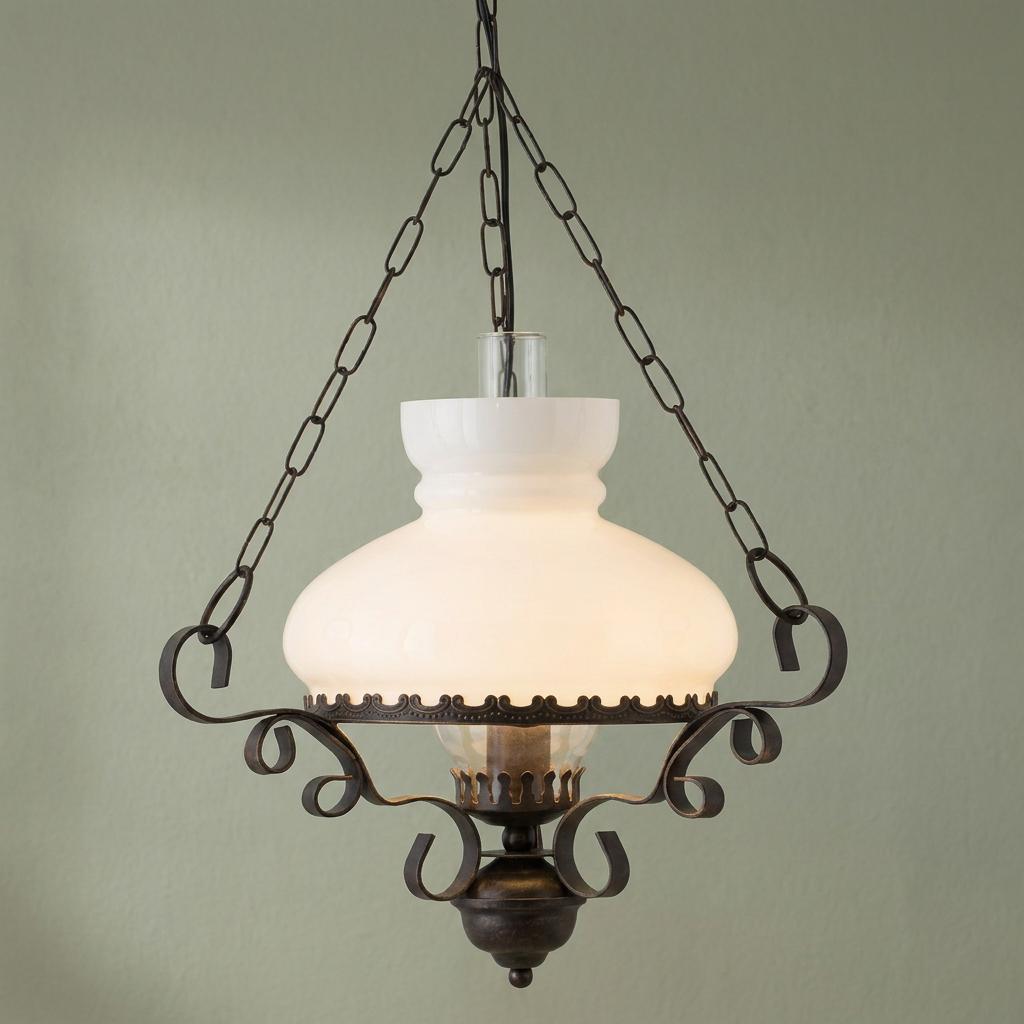Rustic oil lantern ceiling pendant featuring a white frosted glass shade and ornate bronze metal scrollwork.