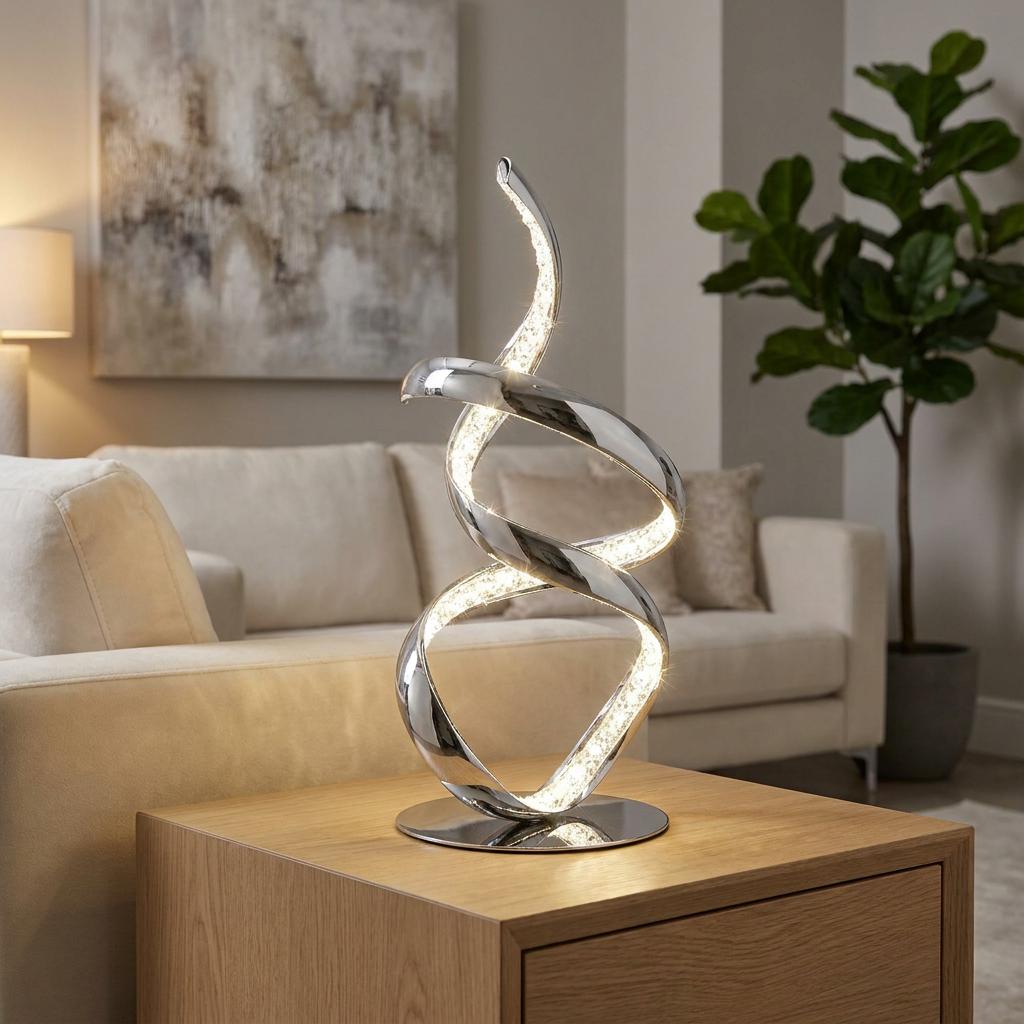 Modern chrome table lamp with a twisting crystal-studded arm glowing on a wooden side table in a living room.