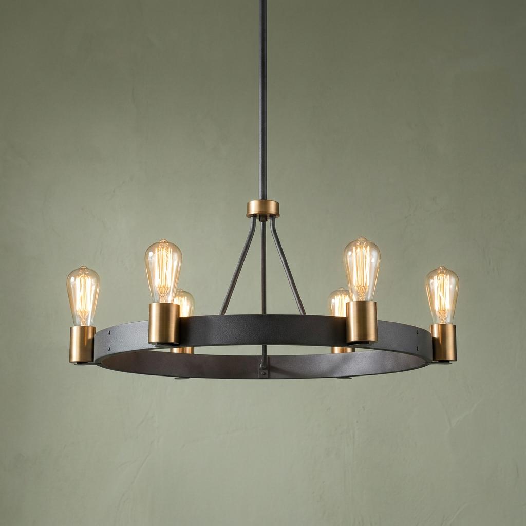 Silas 6-light zinc pendant with brass sockets and warm Edison bulbs against a textured sage green wall.